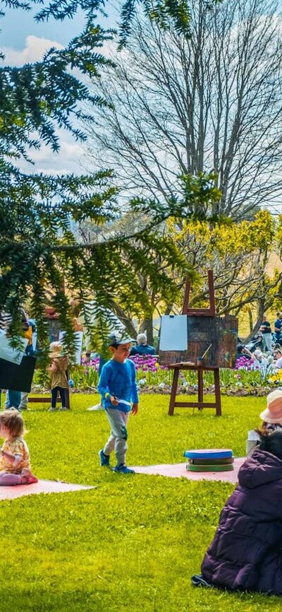 Kids Day Out Families enjoying the Lanyon Homestead lawns at Kids Day Out