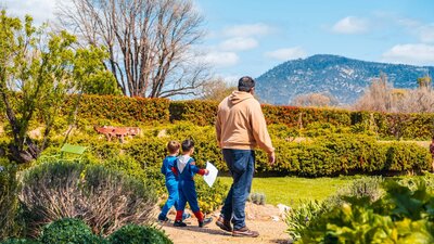 A family completing the scavenger hunt activity at Kids Day Out