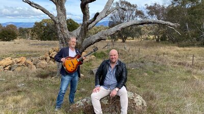 Wayne Kelly and Greg Stott Wayne Kelly and Greg Stott playing music in the bush