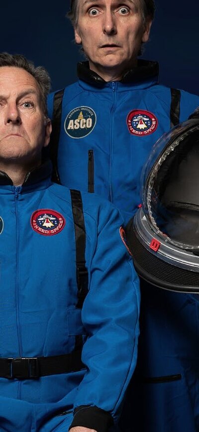 Comedians Colin Lane and Frank Woodley posing for a photo dressed as astronauts