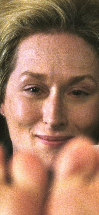 Adaptation (2002) Woman looks past camera, holding phone to ear with her feet in the air