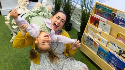 A child playing with an adult at Little Explorers' Days