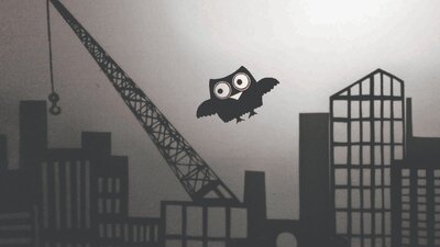 Shadow owl flying over city