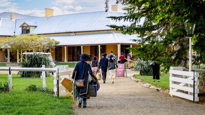 Crowd walking in Lanyon Homestead gates
