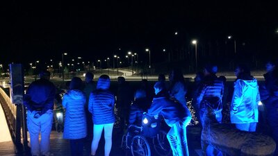 Localjinni leading a collective walk in the dark