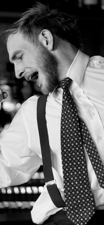 Man at a bar dancing