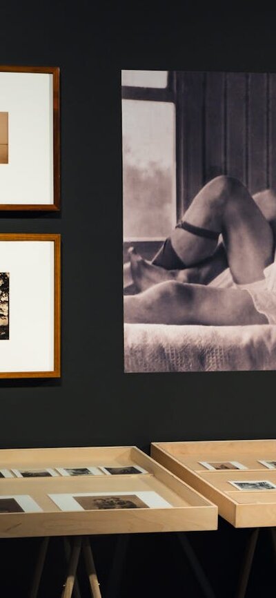 Installation image of photographs in the LOVING exhibition at CMAG