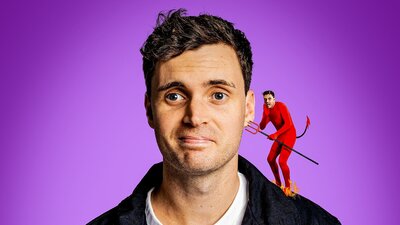 Luke Kidgell with a little version of himself dressed as a devil on his shoulder