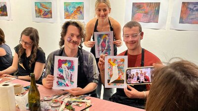 Workshop participants showing off their finished works of art!