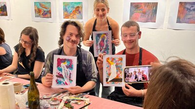 Workshop participants showing off their finished works of art!
