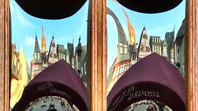 A distorted reflected city.