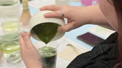 Matcha served at a NOA Matcha ceramic painting workshop