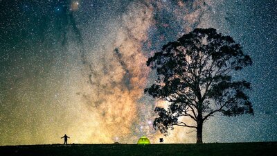 Under the stars Astrophotographer under the Milky Way Core