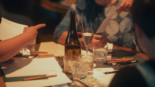 Group of people smiling and drawing
