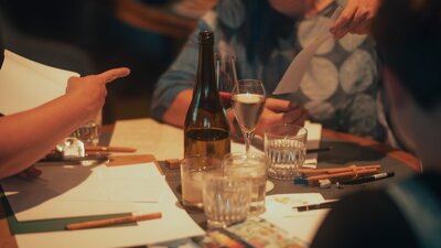 Group of people smiling and drawing
