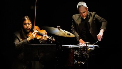 Man playing percussion instruments