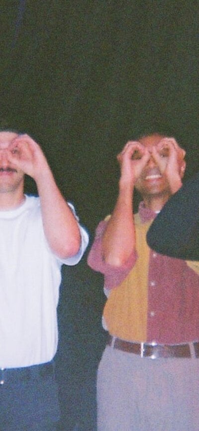 Four artists standing next to each other