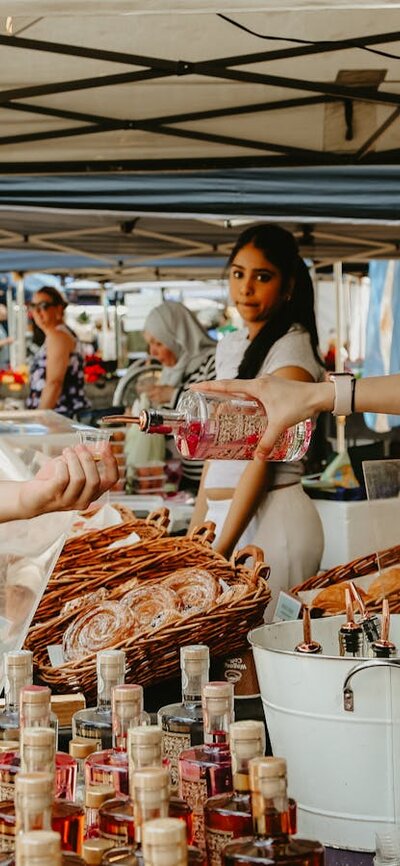 Cocktail making workshops with Ambrosia Distillery A visitor tasting a sample of vodka from Ambrosia Distillery