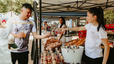 A visitor tasting a sample of vodka from Ambrosia Distillery