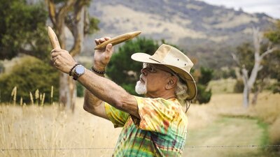 Maring Ngala Walk at Lanyon Homestead Wally Bell using clapping sticks during the Maring Ngala walk