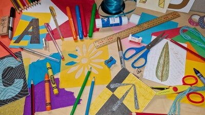 A display of stationary, paper and arts supplies.