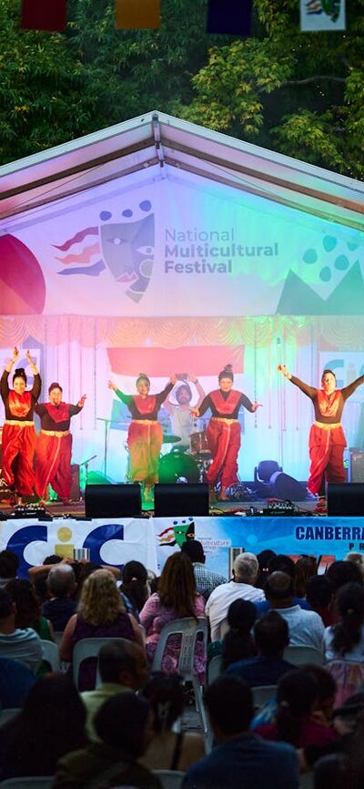 The cultural performances and showcases are unmissable! A group of women dancing on stage at the festival