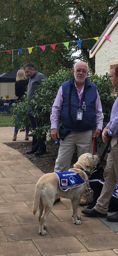 Two Men with companion dogs