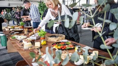 Lady eating providore snacks at the National Wine Experience