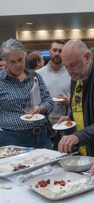National Wine Festival - People eating Meredith Dairy cheese and crackers
