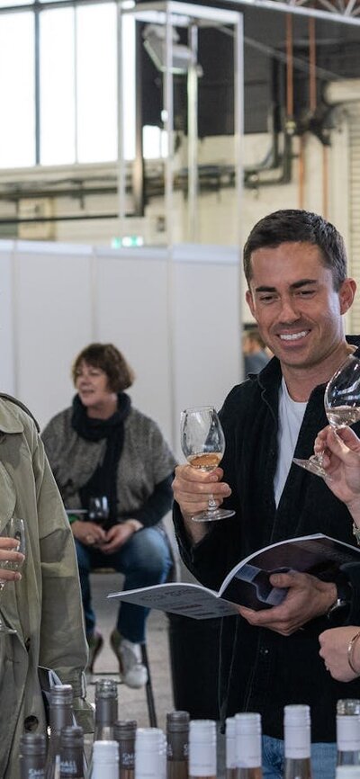 People tasting wine at the National Wine Experience