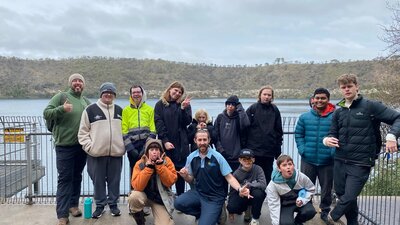 Access Adventure Club staff and participants smiling together in a group photo