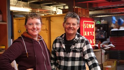 Teaching artist David Cooper with neon artist Rose-Mary Faulkner Neon studio at Canberra Glassworks