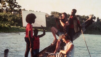 Tukana (1982) Cameraman and actors shooting on a boat on water