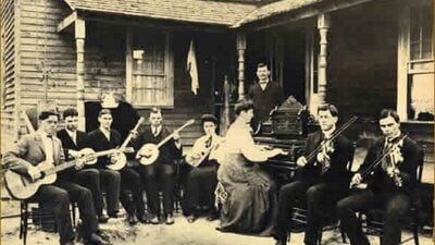 Black and white image of olden days group of musicians