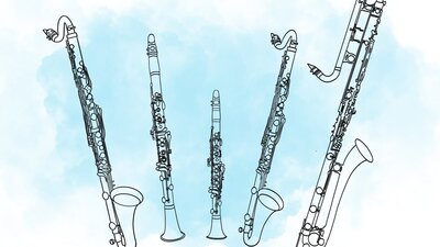 Collection of clarinets on blue background