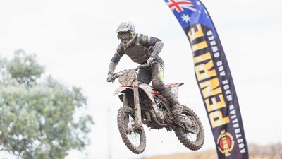 A rider jumping through the air