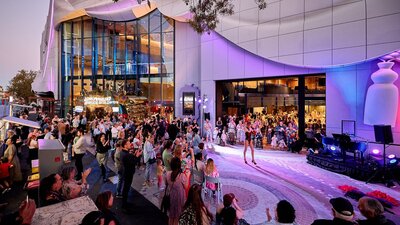 Live entertainment with large crowd on Geelong Arts Centre plaza forecourt