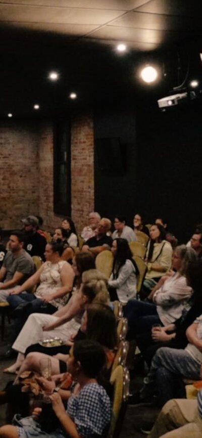 Pint AU Speakers, Townsville Scientist presenting their research to an audience, at Adelaide Pint AU event.