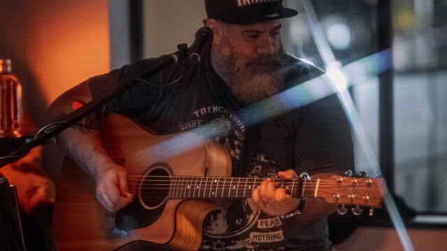 Sean playing guitar