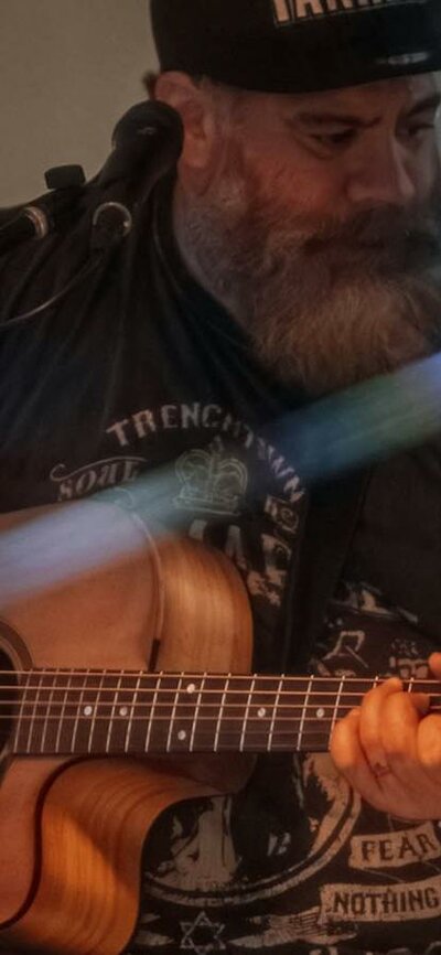 Sean playing guitar