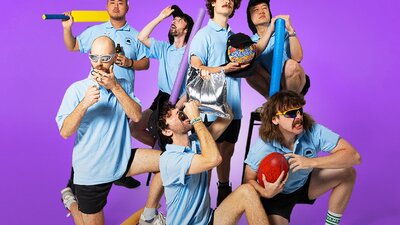 Playlunch band members doing stereotypical Australian  activiities