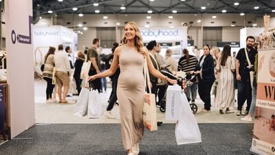 pregnant woman is shopping at pbc baby expo