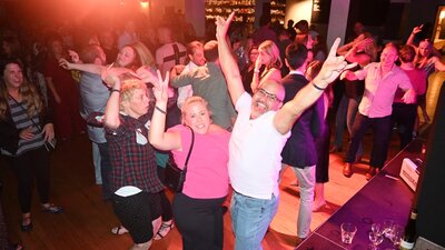 The Crowd People dancing and having fun at the last event