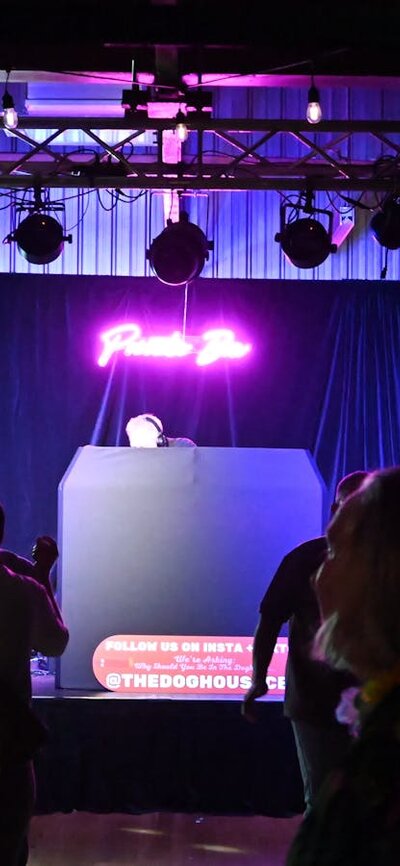 DJ Stage Louie Louie Stage with a DJ set up, Private Bin neon sign