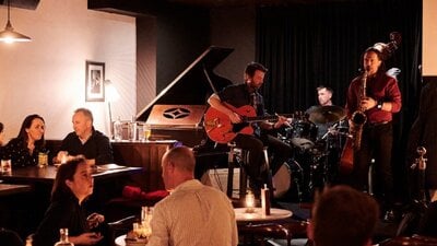 Group of musicians playing instruments