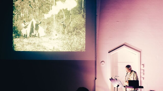 Phillip Johnston performing Pictured is Phillip Johnston performing with his saxophone