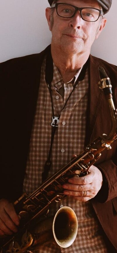 Pictured is Phillip Johnston with his saxophone