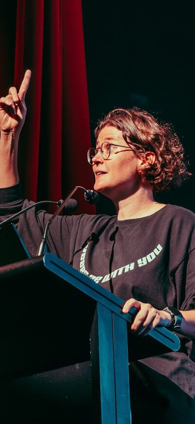 Queer Powerpoint Brisbane, 2025. Photo by Darcy Goss Media. Queer Powerpoint performance at Brisbane