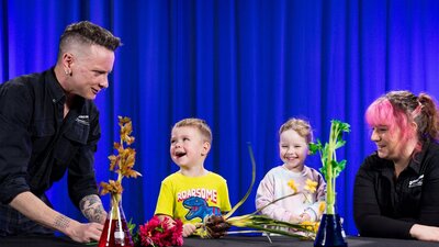 Two children learn about flowers at Science Time: Spring