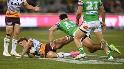 Joe Tapine tackles Reece Walsh in their last game in Canberra.